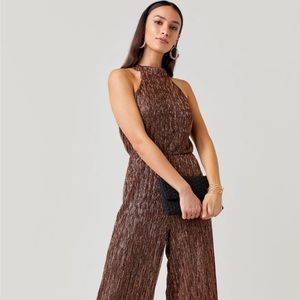 Francesca’s Vicki High Neck Shimmer Jumpsuit